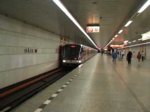 Train arriving at Háje metro station
