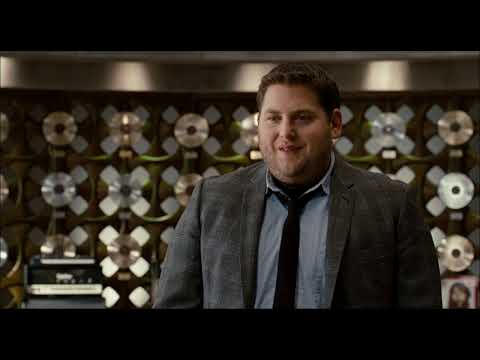 Trailer frame of the Greek Theatre payoff where the soundtrack’s mock-anthems resolve the arc