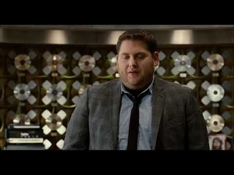 Trailer still hinting at the glam-meets-mess aesthetic that the songs parody