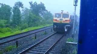 preview picture of video 'Trucks on Track are Railing in Rain. (Indian Railways)'