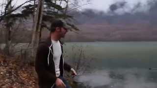 Skippng  stone on a frozen Lake