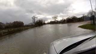 preview picture of video 'Fording the River Avon in Flood at Melksham in Wiltshire, 25.11.12'