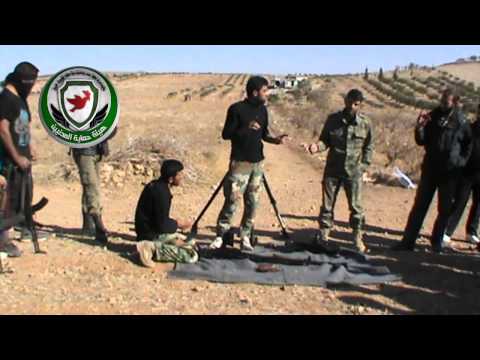 المعسكر التدريبي للواء معاوية بن أبي سفيان درس تدريبي لفك وتركيب رشاش دوشكا