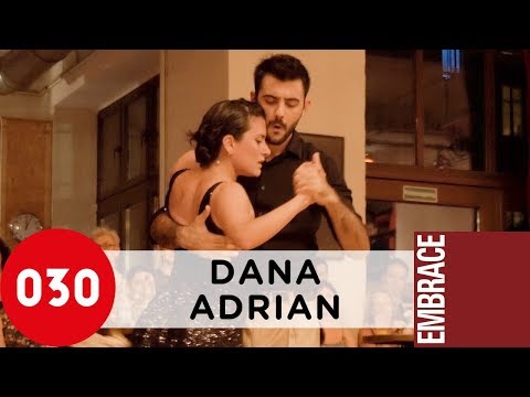  Adrian Ferreyra  and  Dana Frigoli  are  dancing  to  the  tango  "  Fumando Espero  "  by  Carlos di Sarli  at  Embrace Berlin Tango Festival  in  2016