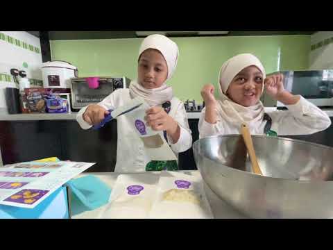 Azeen and Ayra Bake White Chocolate Cranberry Macadamia Cookies