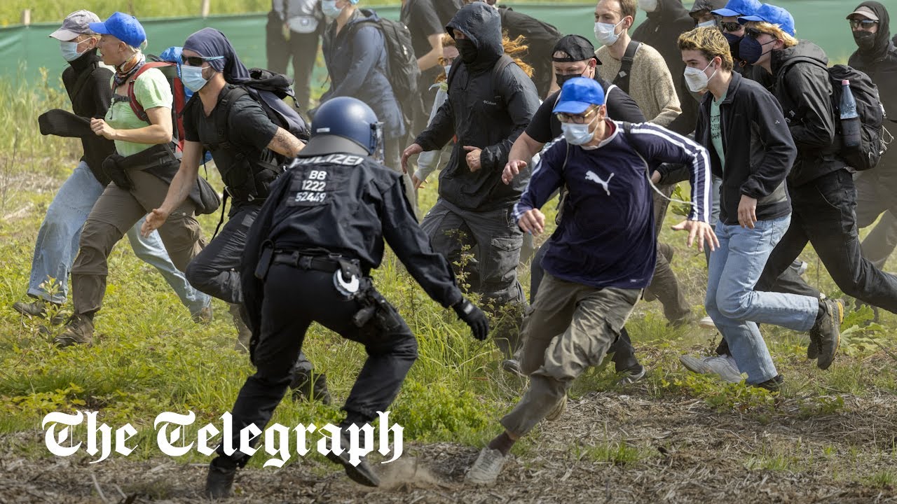 Watch: Activists overwhelm police to storm Tesla gigafactory
