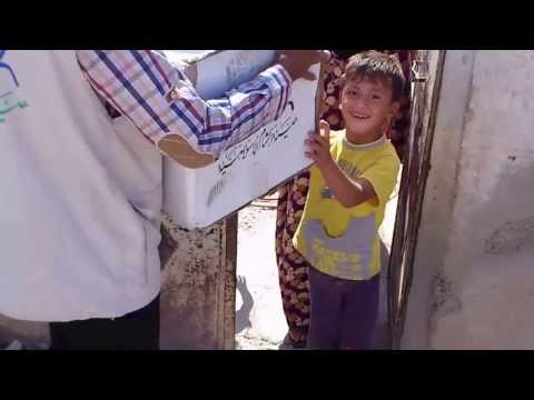 توزيع سلل إغاثية في مدينة الرقة في محافظة الرقة من قبل هيئة الشام الاسلامية