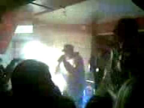 Kiraz performance shooting uzi in club