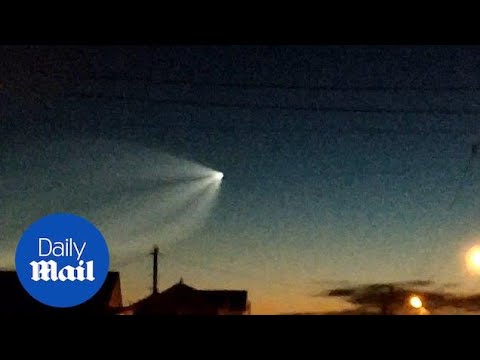 Russian rocket is seen streaking accross night sky in Russia