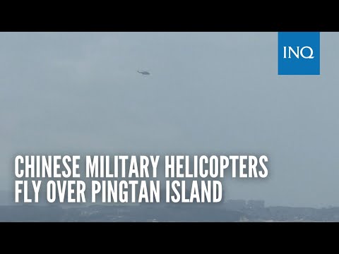 Chinese military helicopters fly over Pingtan island