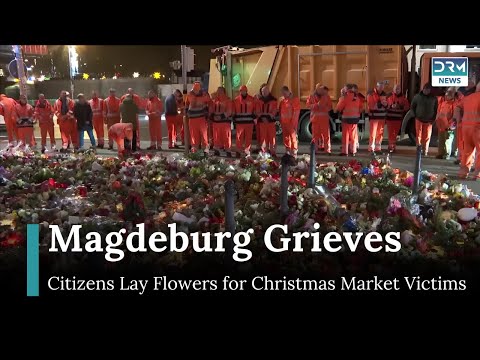 Magdeburg Mourns: Flowers Left Outside Church for Victims of Christmas Market Attack | AB1G