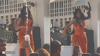 Cardi B throws mic into crowd after drink tossed at her on stage in Las Vegas