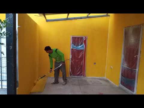 Pintura amarelo capa de chuva com Jetroller da Graco