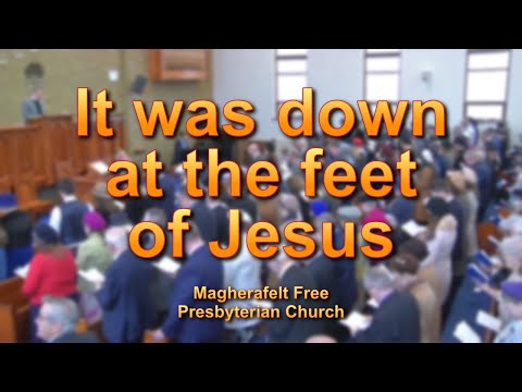 It was down at the feet of Jesus