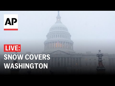 LIVE: View of US Capitol as snow covers Washington