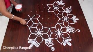 very easy flower rangoli designwith 9x5 dots beaut