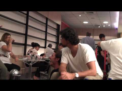 Philippoussis explains his dogwalking skills to Safin, Courier and Pioline in the Rio airport lounge