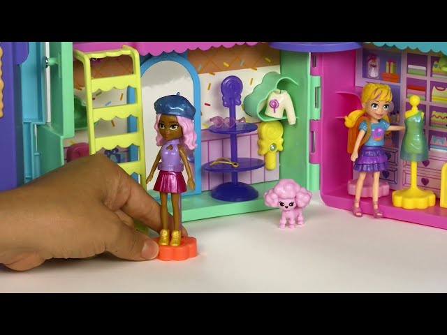 Vídeo relacionado con Polly Pocket Máquina expendedora de Ropa Conjunto de Juego con 2 muñecas (7,6cm), 2 Pisos, más de 35 Piezas Entre Muebles, Ropa y Accesorios, HKW12