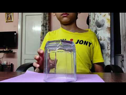 How to push coin through glass magic trick