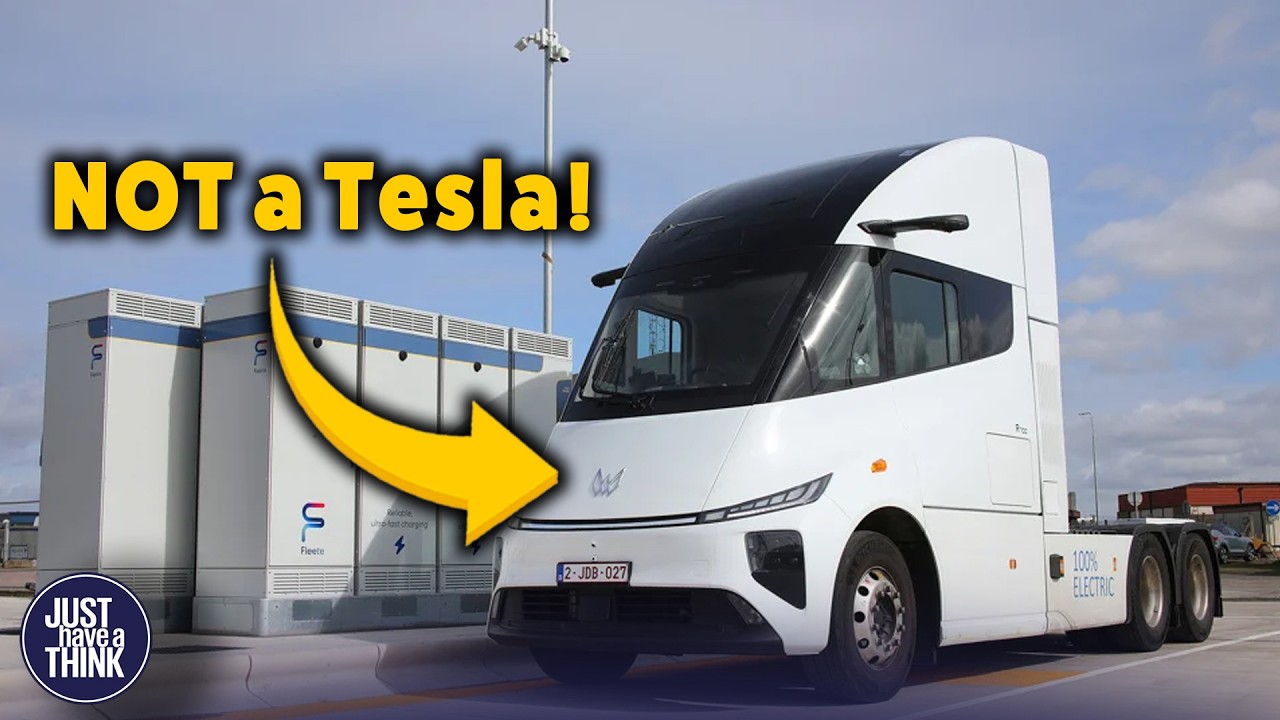 Electric heavy trucks charging at a freight depot, representing China's scaling electric truck market
