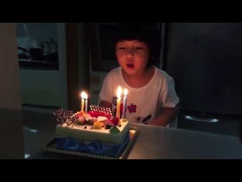 kid sings Happy Birthday songs for Mommy and blow candles.
