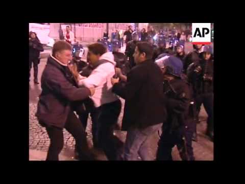 Sarkozy opponents clash with police in Paris and Lyon