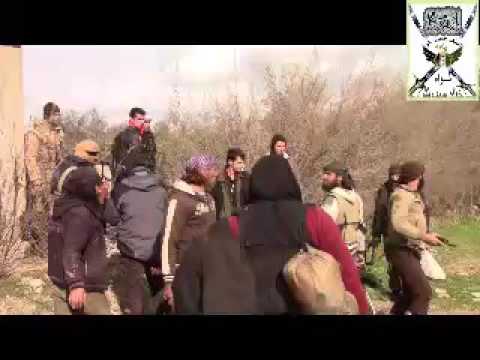 تقدم عناصر لواء خالد سيف الله لاقتحام احد نقاط قوات النظام على جبهة الشيخ مسكين في ريف درعا