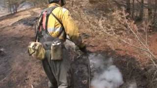 preview picture of video 'Alberta firefighters mopping up on the Kelly Creek fire'