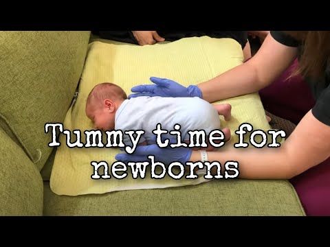 Getting a baby into tummy time
