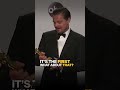 Leonardo DiCaprio tries not to laugh