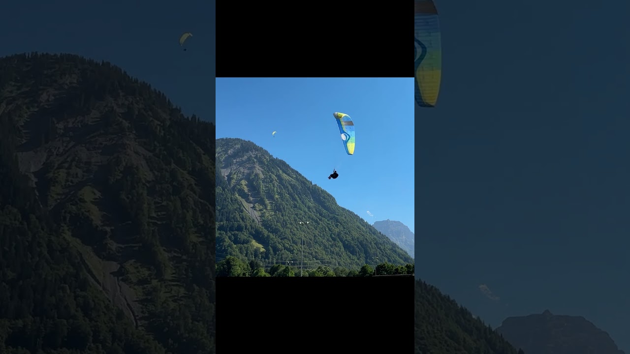 Smooth Landing: Paragliding Perfection #switzerlands #glarus #paraglidingvideo