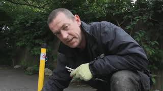 How to install a fold down parking post onto a Tarmac surface.