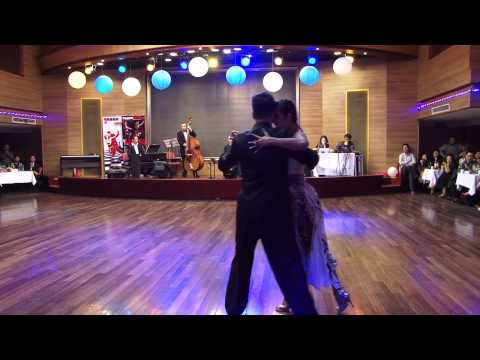  Sebastian Achaval  and  Roxana Suarez  are  dancing  to  a  tango  at  Shanghai Tango Marathon  in  2013
