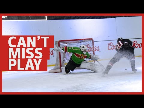 ICE HOCKEY | Zach Steele makes an incredible move to shift the goalie and score for the Blackhawks