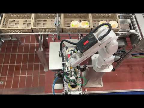 Fanuc Roboter um Joghurt abzupacken | Migros - Estavayer Lait SA (ELSA)