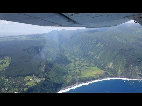 (HD) Flying over Waipio Valley - Hiilawe Waterfalls - Big Island Hawaii