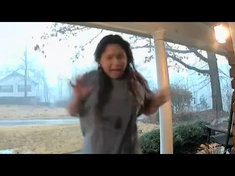 Lightning Strike Startles Woman Bringing in Her Packages