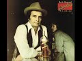 I Didn't Mean To Love You by Merle Haggard from his album Serving 190 Proof.