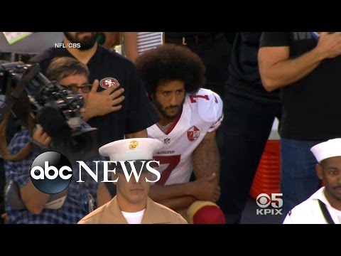 Colin Kaepernick Takes a Knee for National Anthem