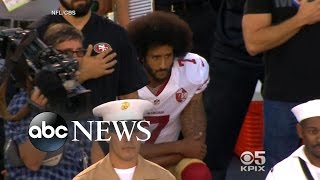 Colin Kaepernick Takes a Knee for National Anthem