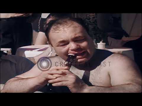 "Two Ton" Tony Galento Training and drinks beer at Miami Beach - Color Reel ca. 1938