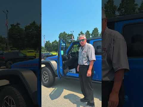 Used 2025 Hydro Blue Pearlcoat Jeep Rubicon image 1