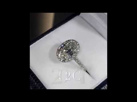 2.02 ct Oval cut Diamond Halo Engagement Ring in Cathedral Band