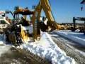 2003 John Deere 310SC Cleanning Snow