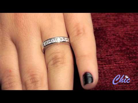 Classy wedding band, with AAA high quality 7 princess cut stones set in channel setting. Item #P8150