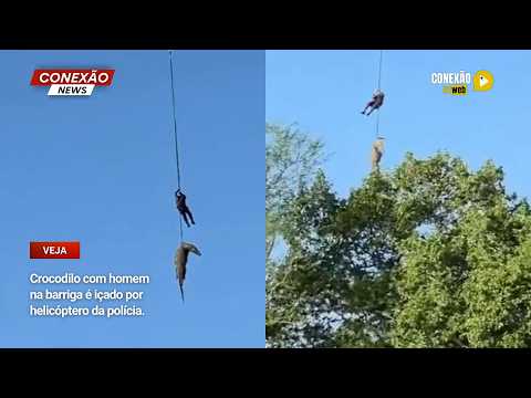 Vídeo: Crocodilo com homem na barriga é içado por helicóptero da polícia.