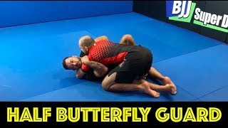 Mastering the Half Butterfly in Half Guard: A Comprehensive Guide by Tom Deblass