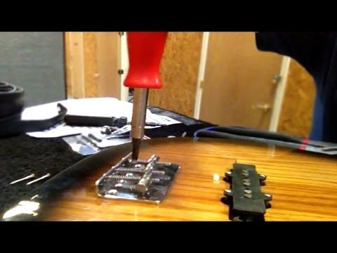 how to remove replace a bridge tailpeice off glendale electric bass guitar