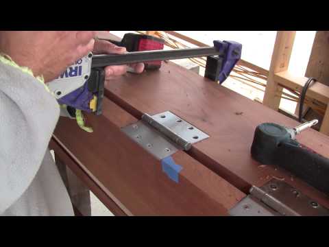 The Woodpecker Ep 64 - Building the new shop part 11 - The frame of the front doors