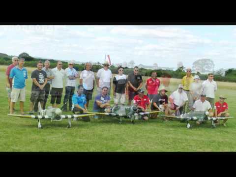 PILOTS POSEING AT THE END OF WILLIS WARBIRDS RC MODEL AIRSHOW AT LITTLE GRANSDEN